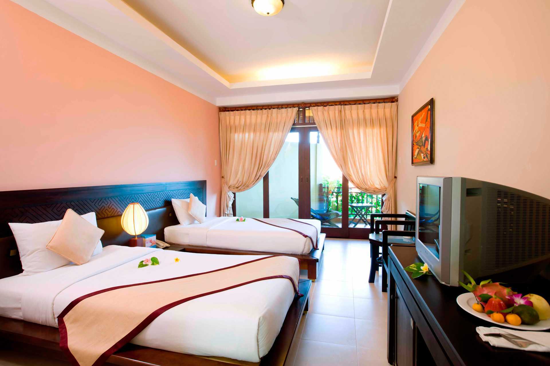 Deluxe-huone Hotelli Romana Resortissa Phan Thietissä, Vietnamissa.