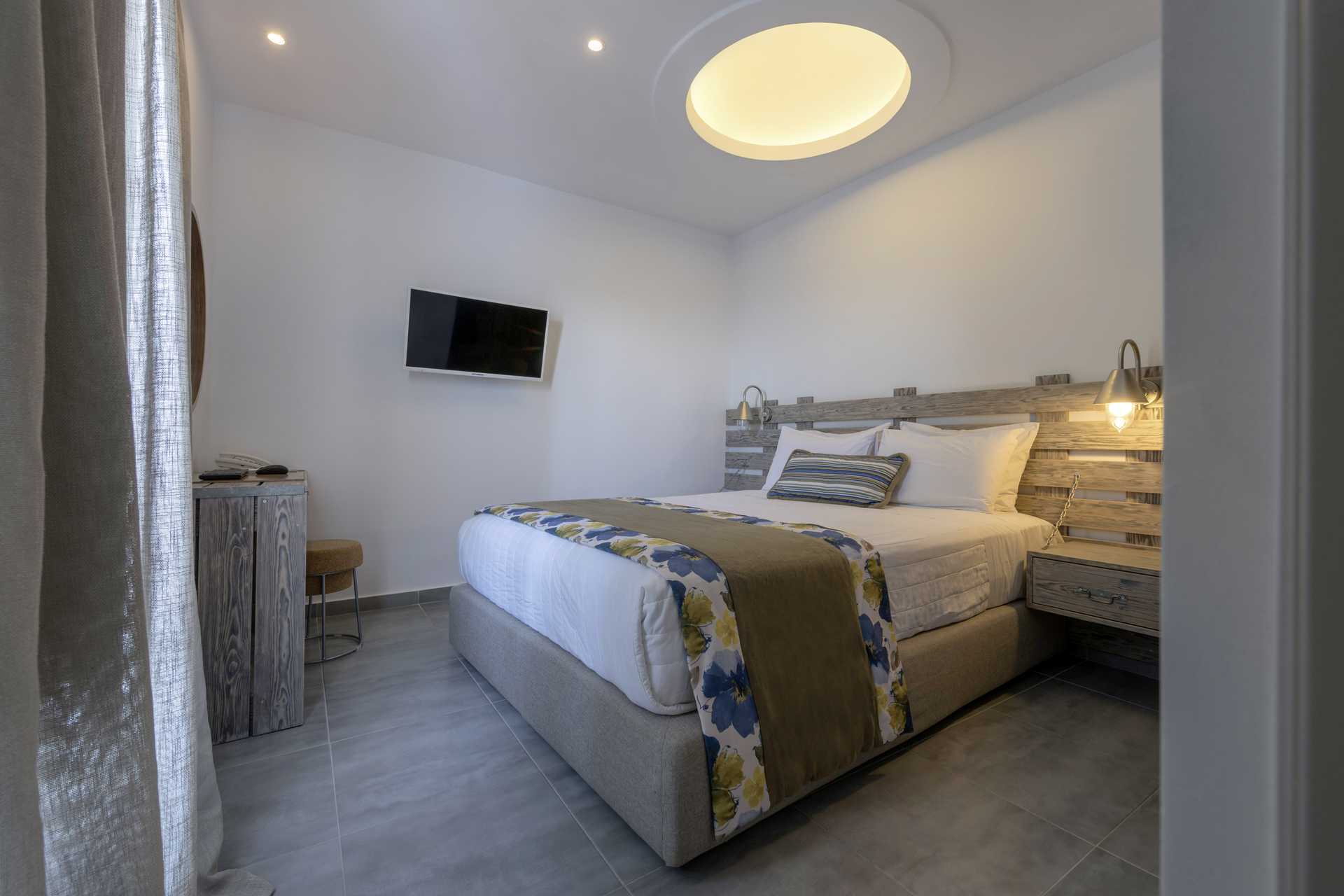 Deluxe-huoneet Caldera's Dolphin Suitesissa Santorinissa, Kreikassa.