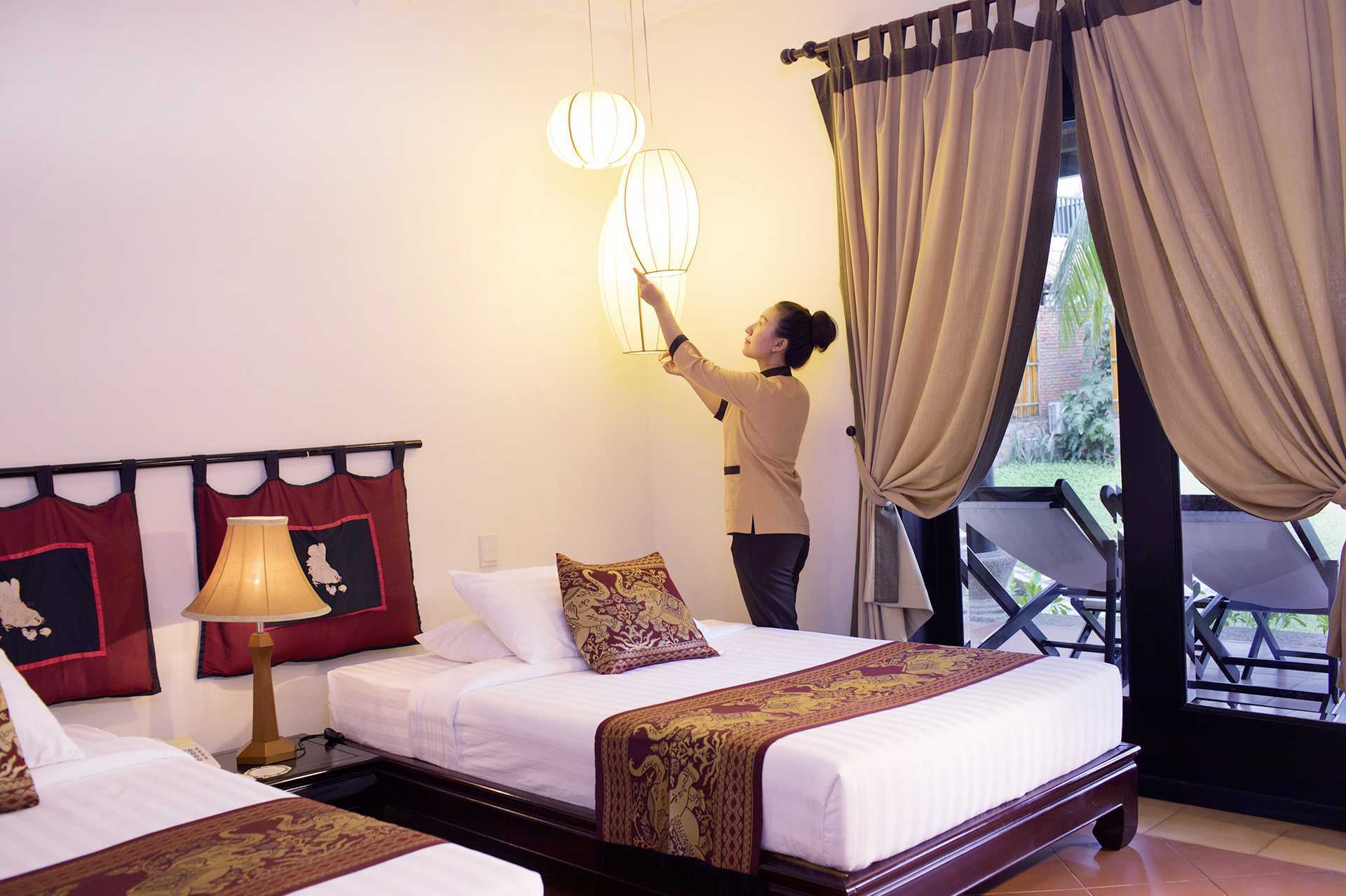 Kahden hengen huone bungalowissa Hotel Seahorse Resort &amp; Spassa Phan Thietissä, Vietnamissa.