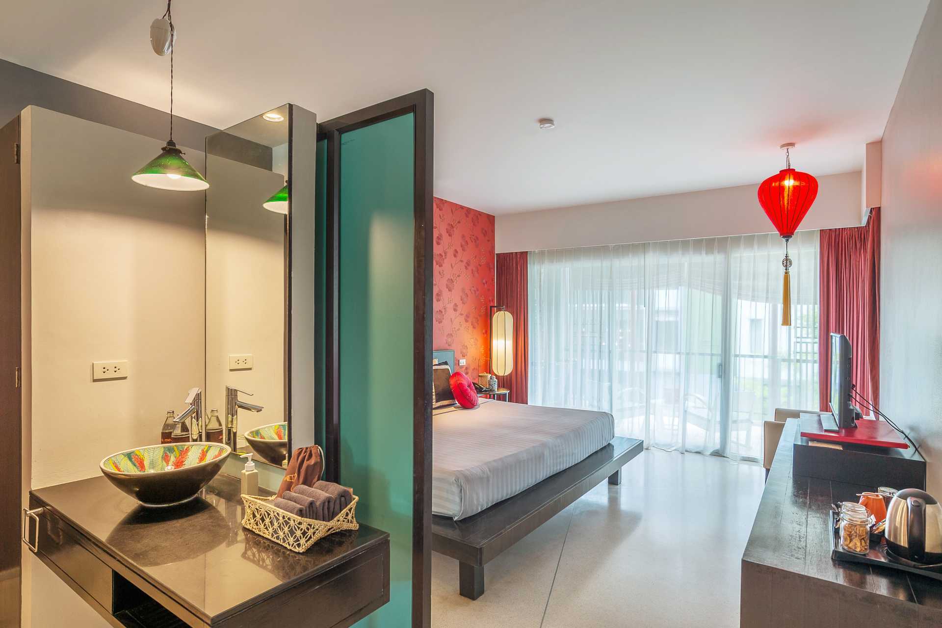 Kahden hengen huone Red Ginger Chic Resortissa Krabissa, Thaimaassa.
